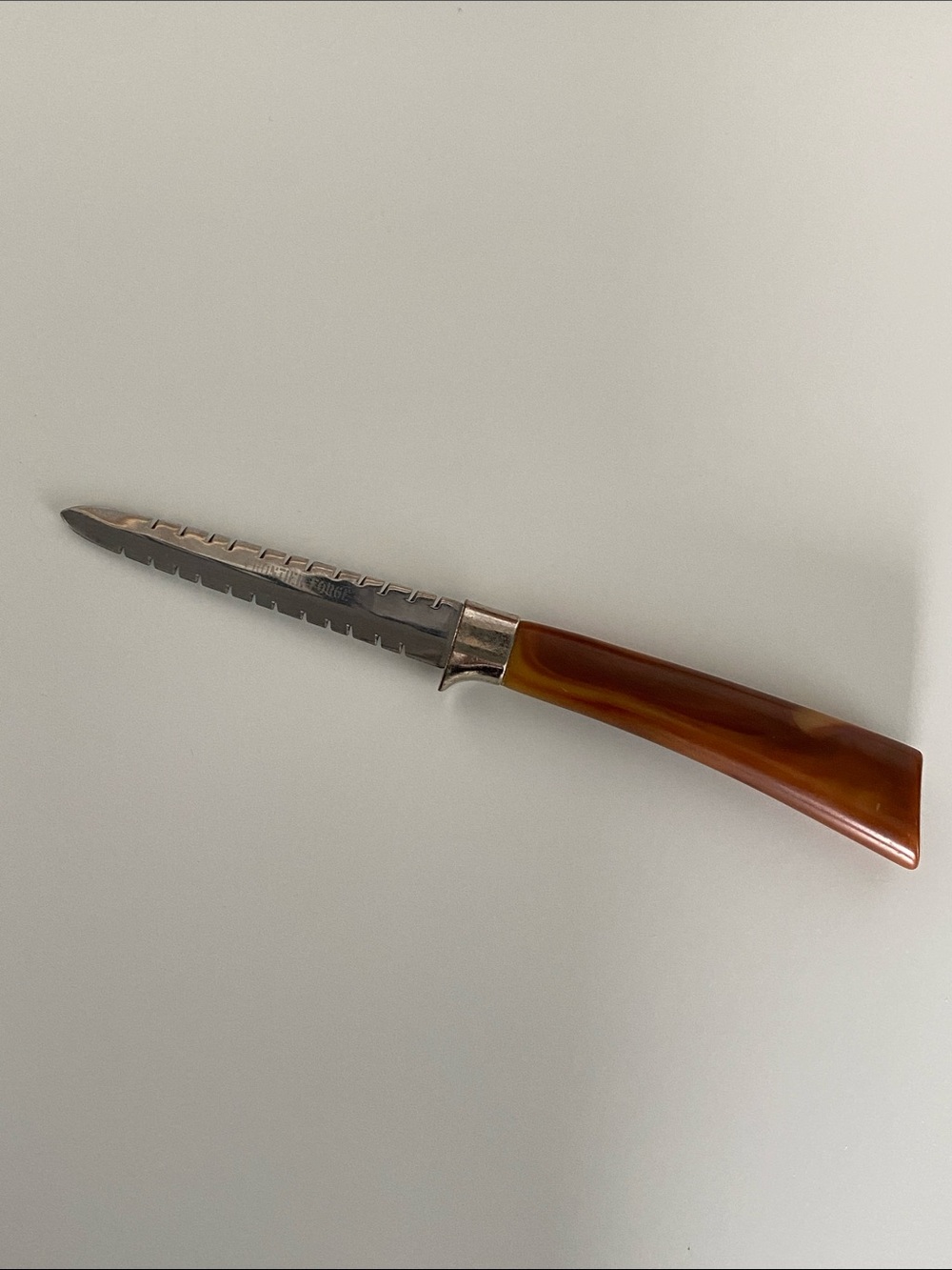Vintage Frontier Forge Double Serrated Utility Knife with Brown Bakelite Handle
